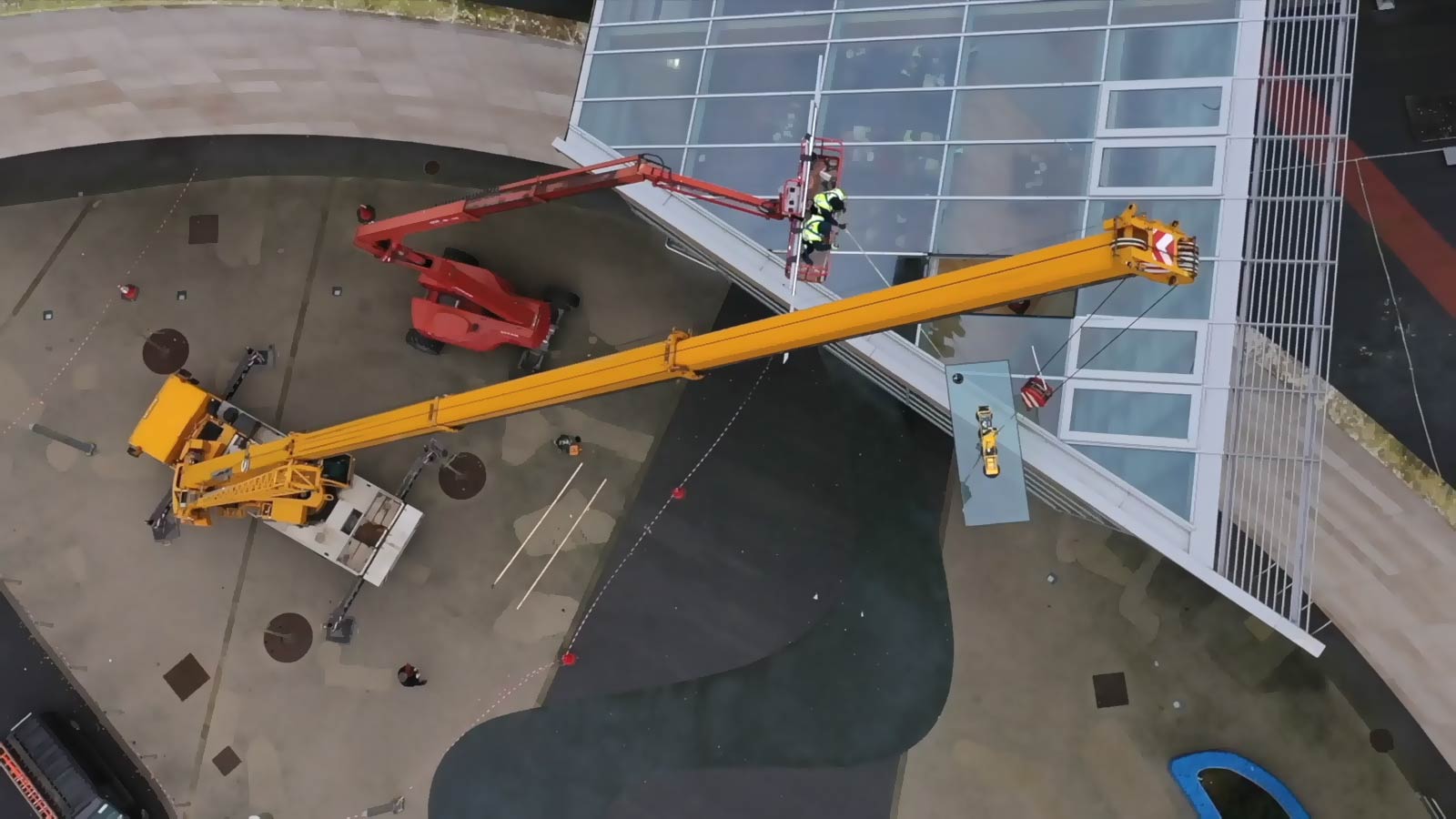 Liffey Crane Hire spider crane and glass vacuum lifter in action on construction site
